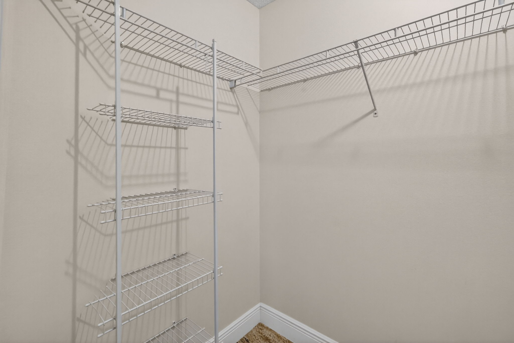 Primary Bedroom First Walk-In Closet