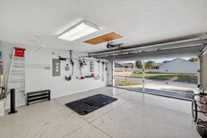 Garage with Motorized Screen