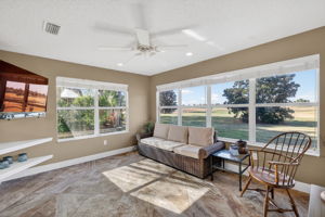 Florida Room overlooking Magnificent Water and Golf Front Views!