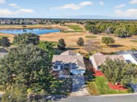 Aerial with Magnificent Water and Golf Front Views!