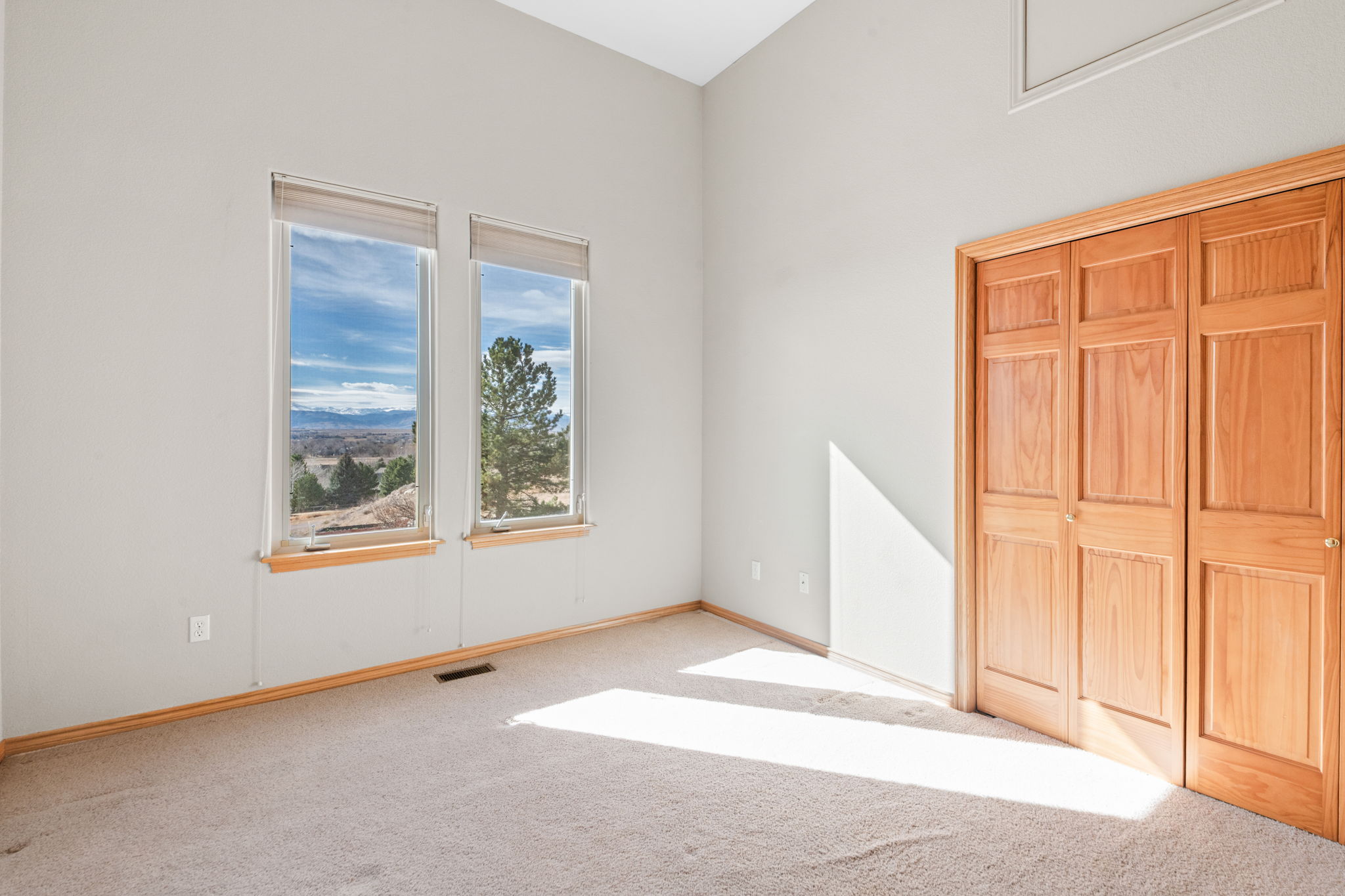 1 of 2 Bedrooms on Main Level with West Windows