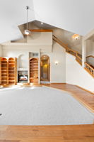 Stairs and Loft to Private Primary overlooking Living room