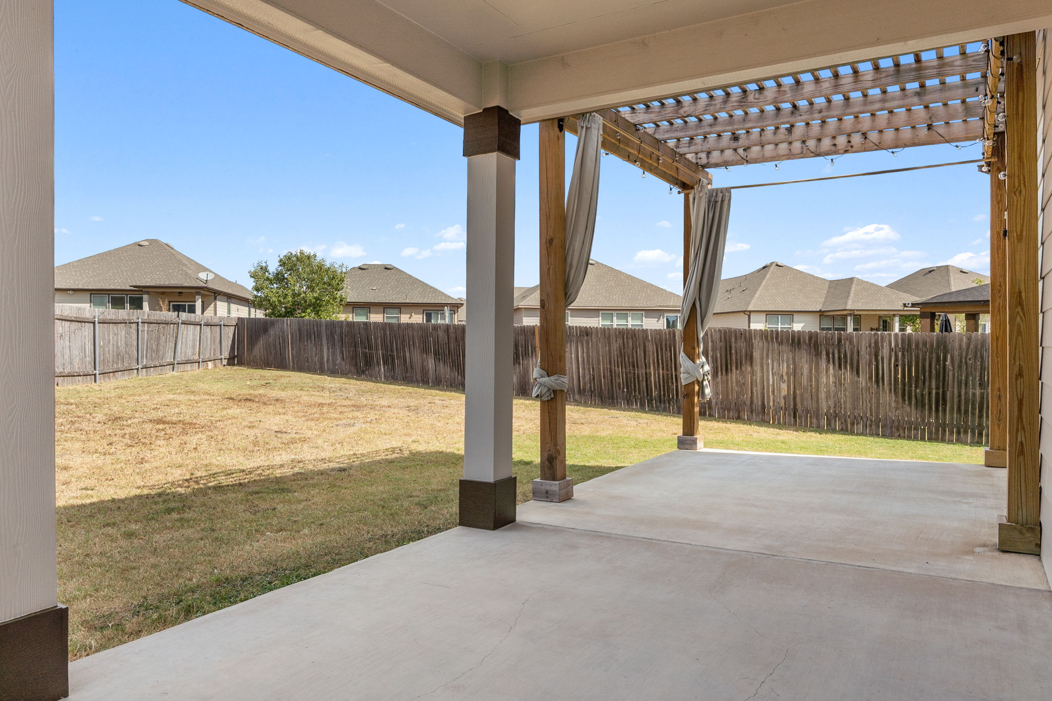 Extended covered patio with party lights!