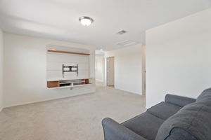 Spacious game room with a walk-in closet (Can easily be enclosed to make it to BR 4)