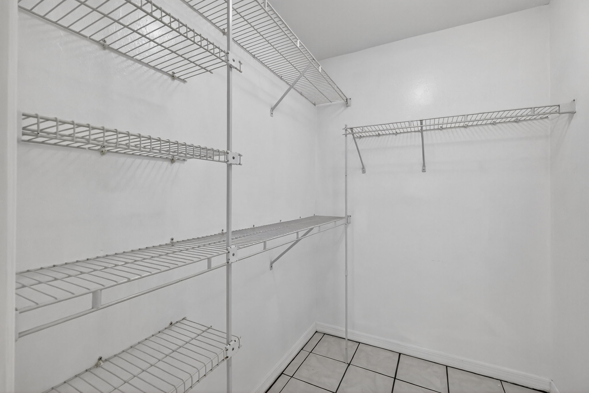 Primary Bedroom First Walk-In Closet