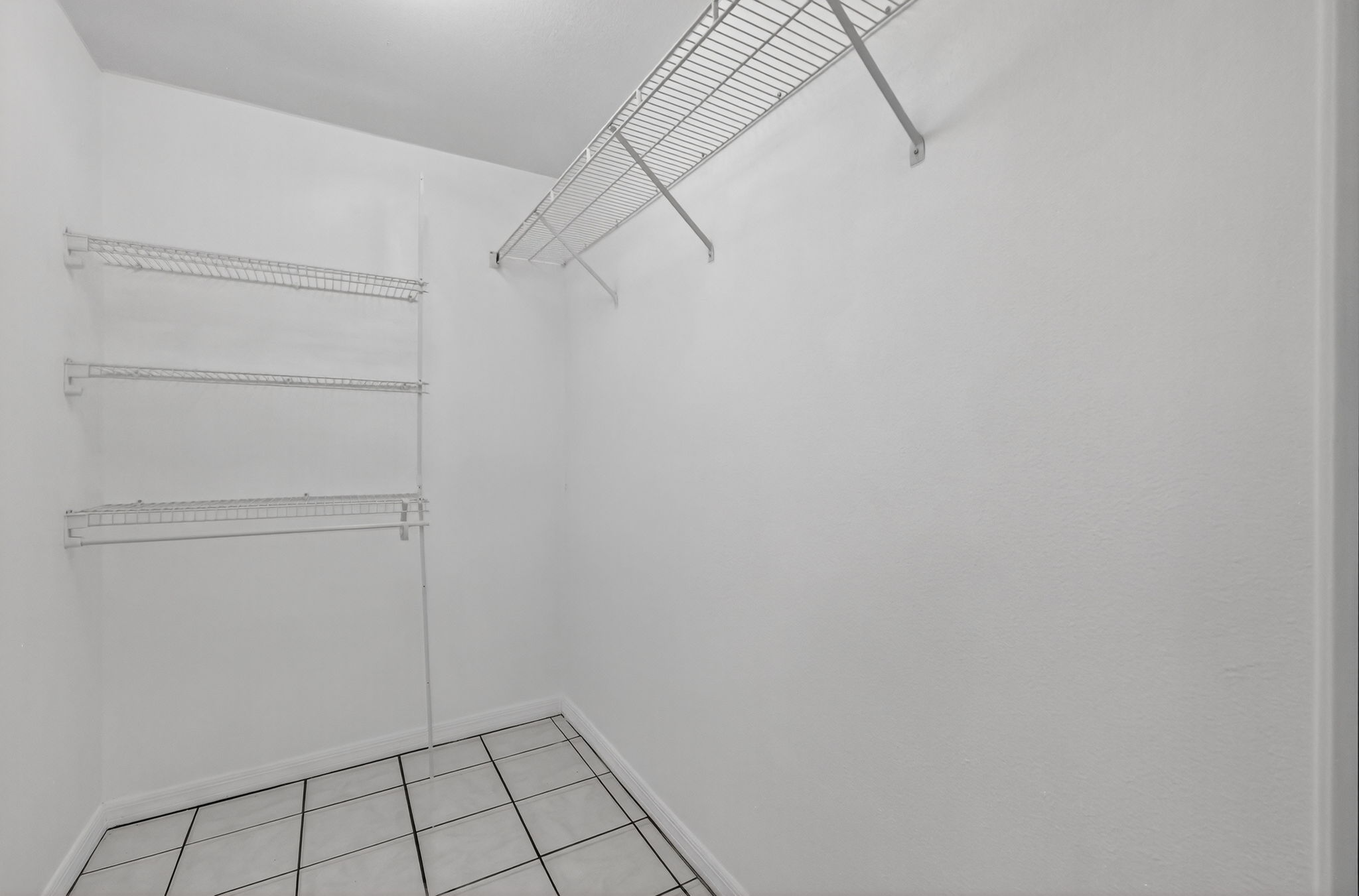 Primary Bedroom Second Walk-In Closet