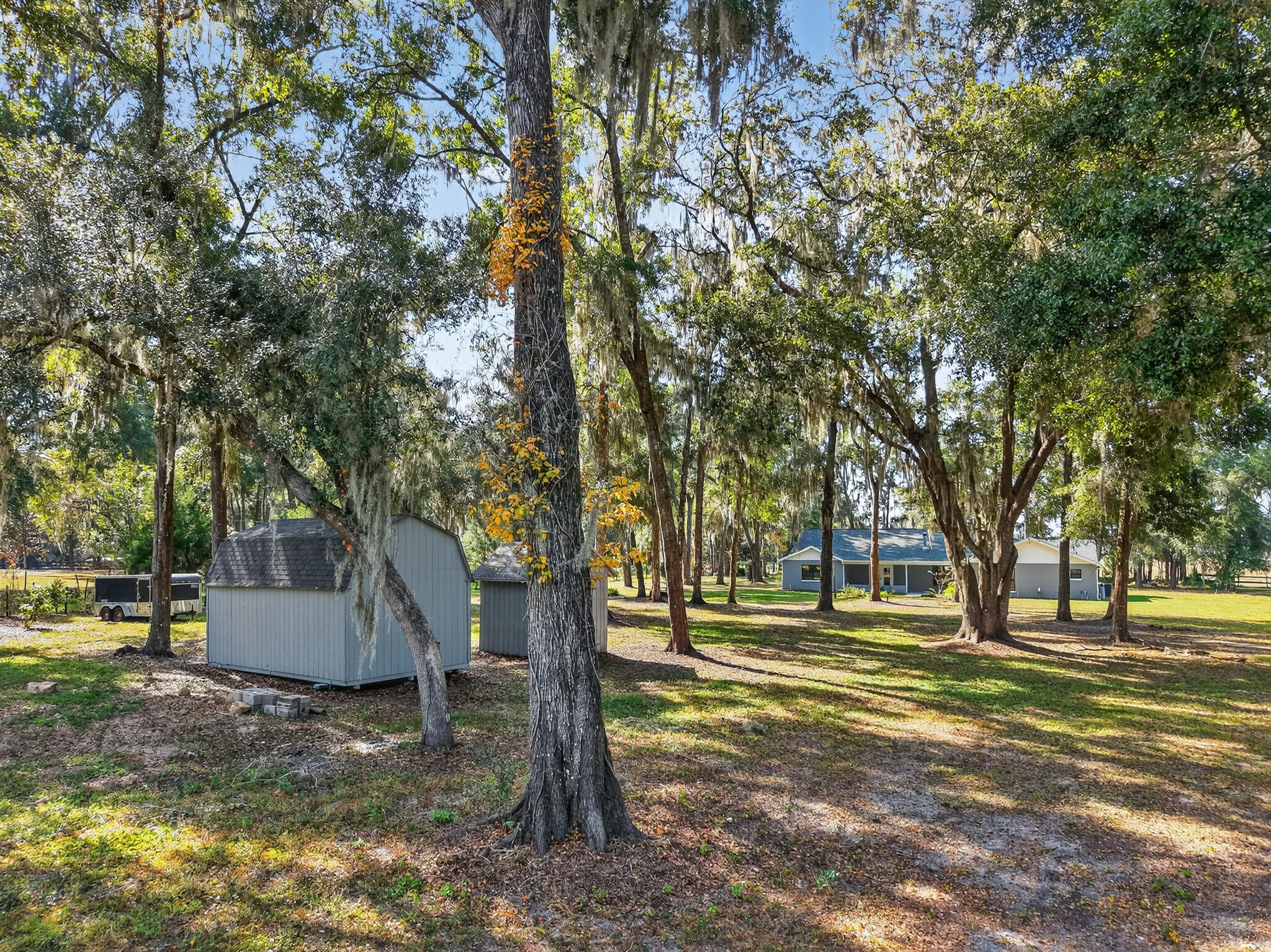 Storage Sheds with Rear View of Home