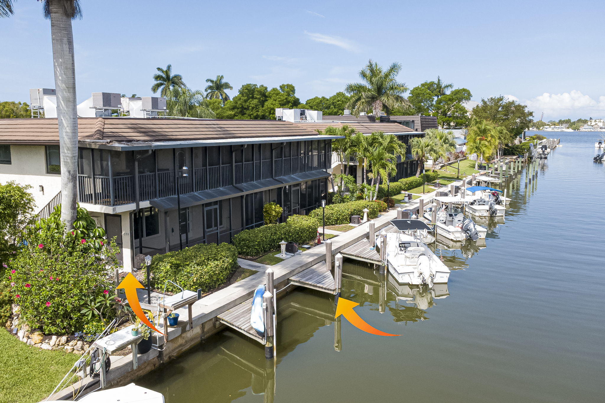 Aerial perspective highlighting the unit's direct access to the intersecting canal system and local mangrove preserves.