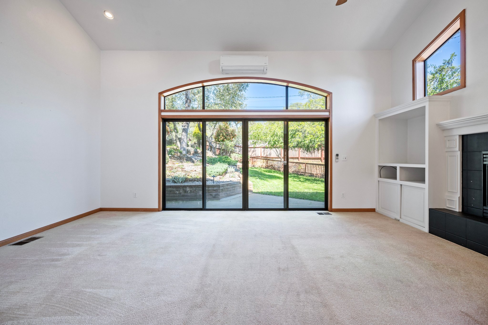 Living Room w/Double sliding Door's and Upper Windows