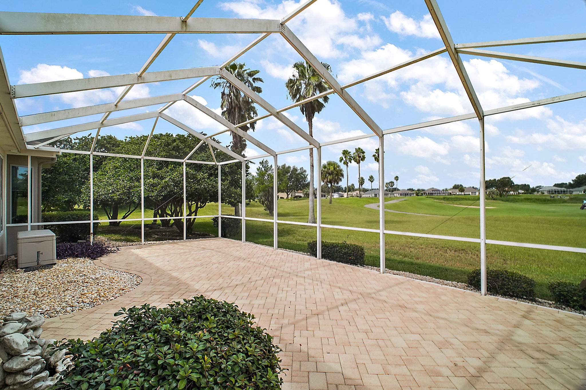 Expansive Screen Porch with Golf Course Views