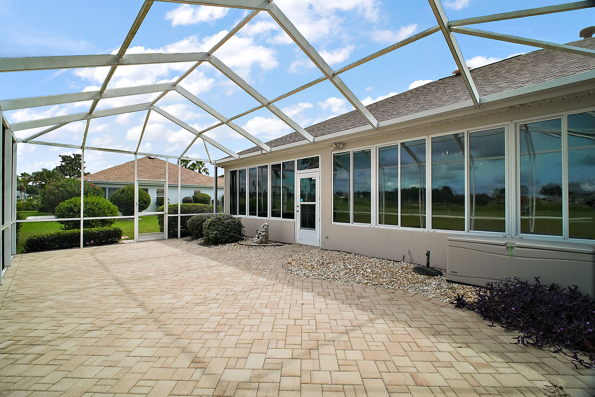 Expansive Screen Porch with Golf Course Views