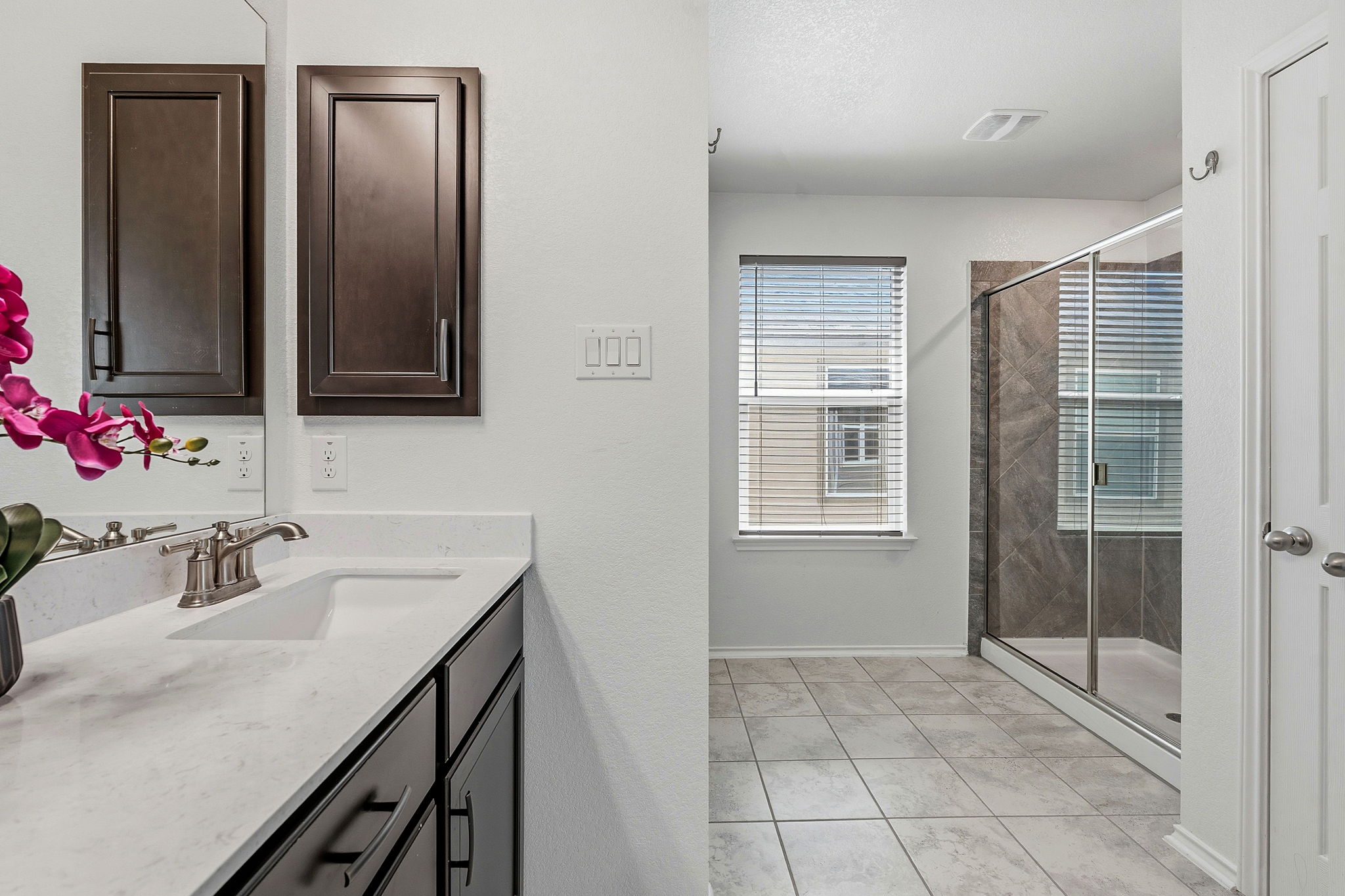 Large shower. No tub to catch dust bunnies!
