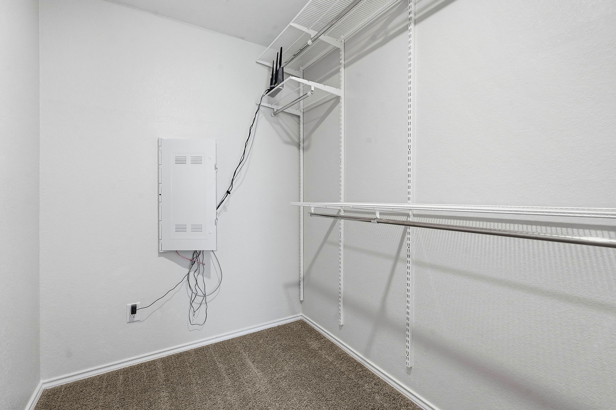 Walk in closet in the primary bath.