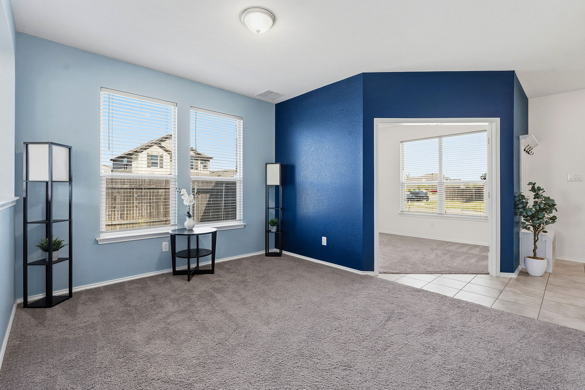 Study is through that opening and front door on the right.