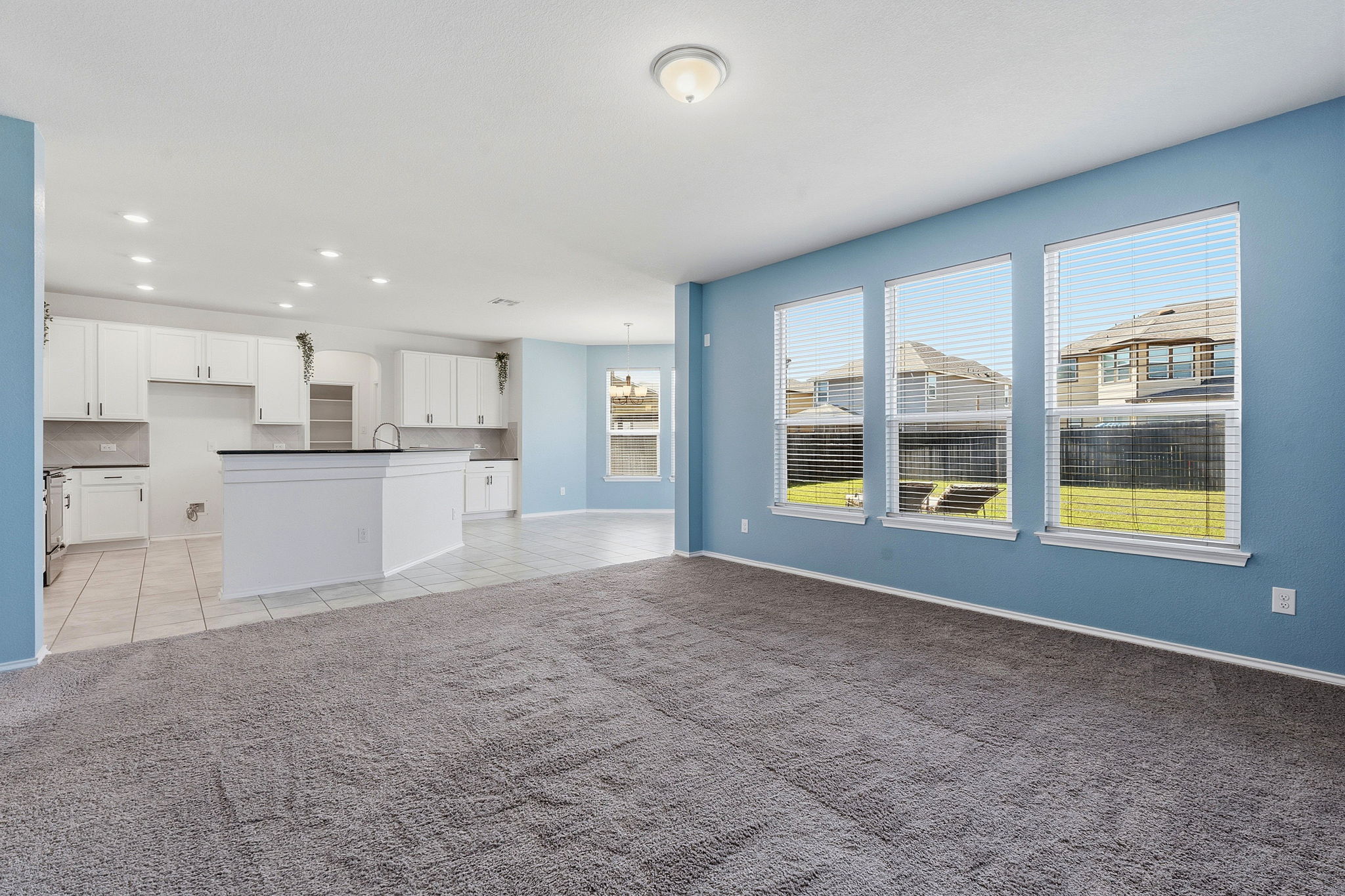 Living is open to the kitchen and the breakfast area.