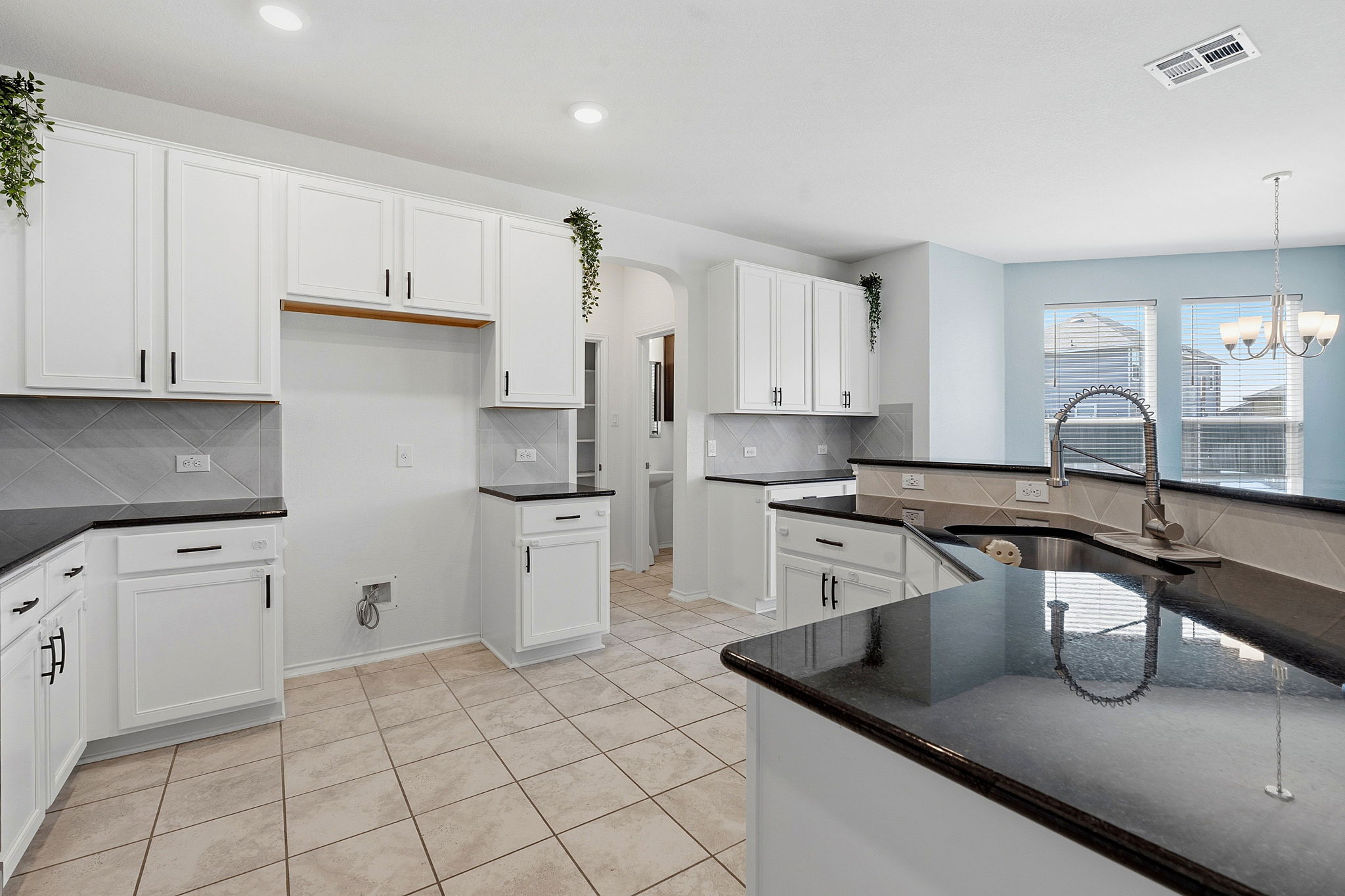 Open and bright!  The half bath is straight ahead.