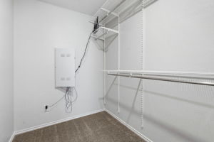 Walk in closet in the primary bath.