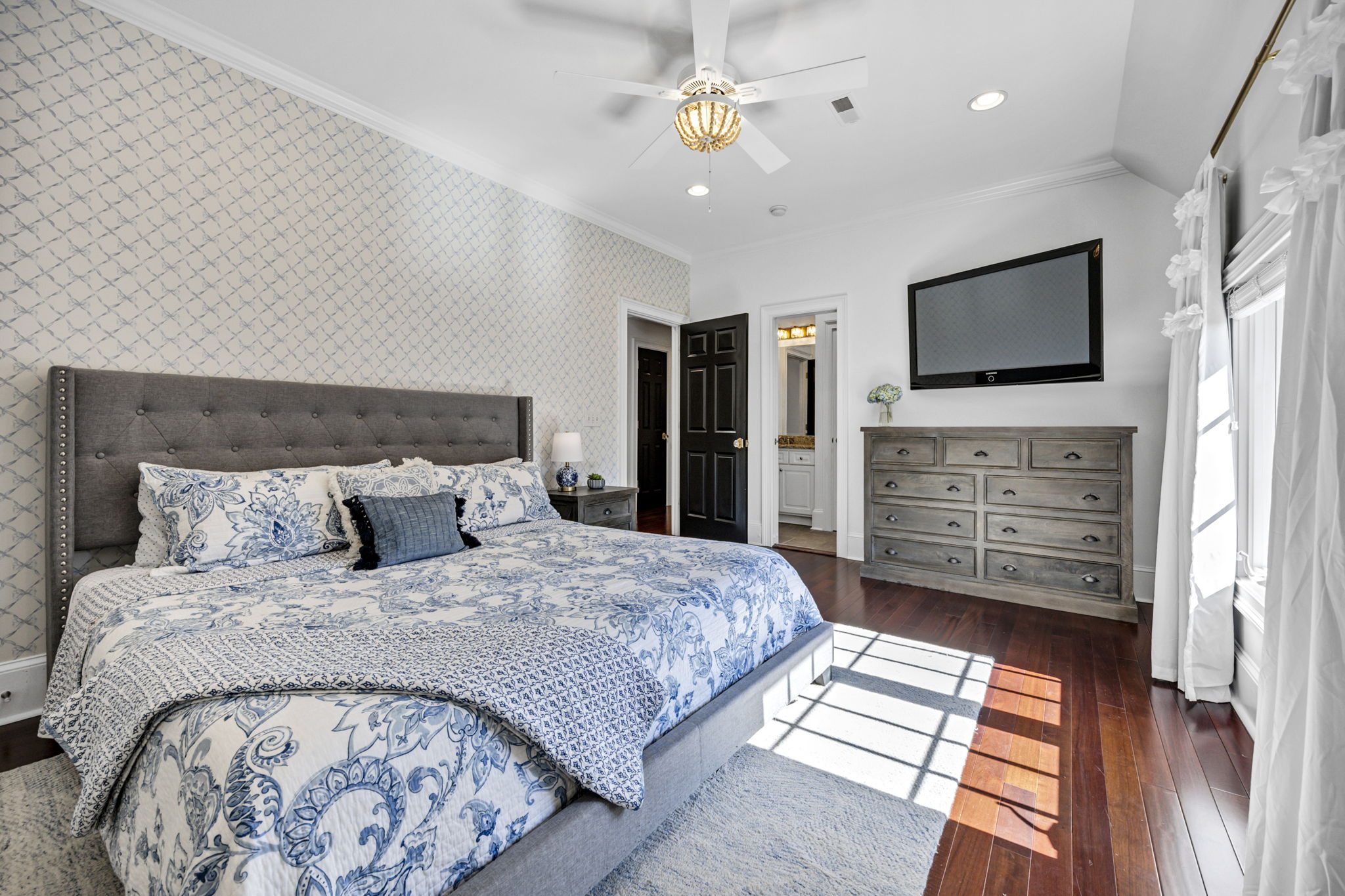 upstairs bedroom 3 w ensuite hall bath and built-in desk area, 2 closets