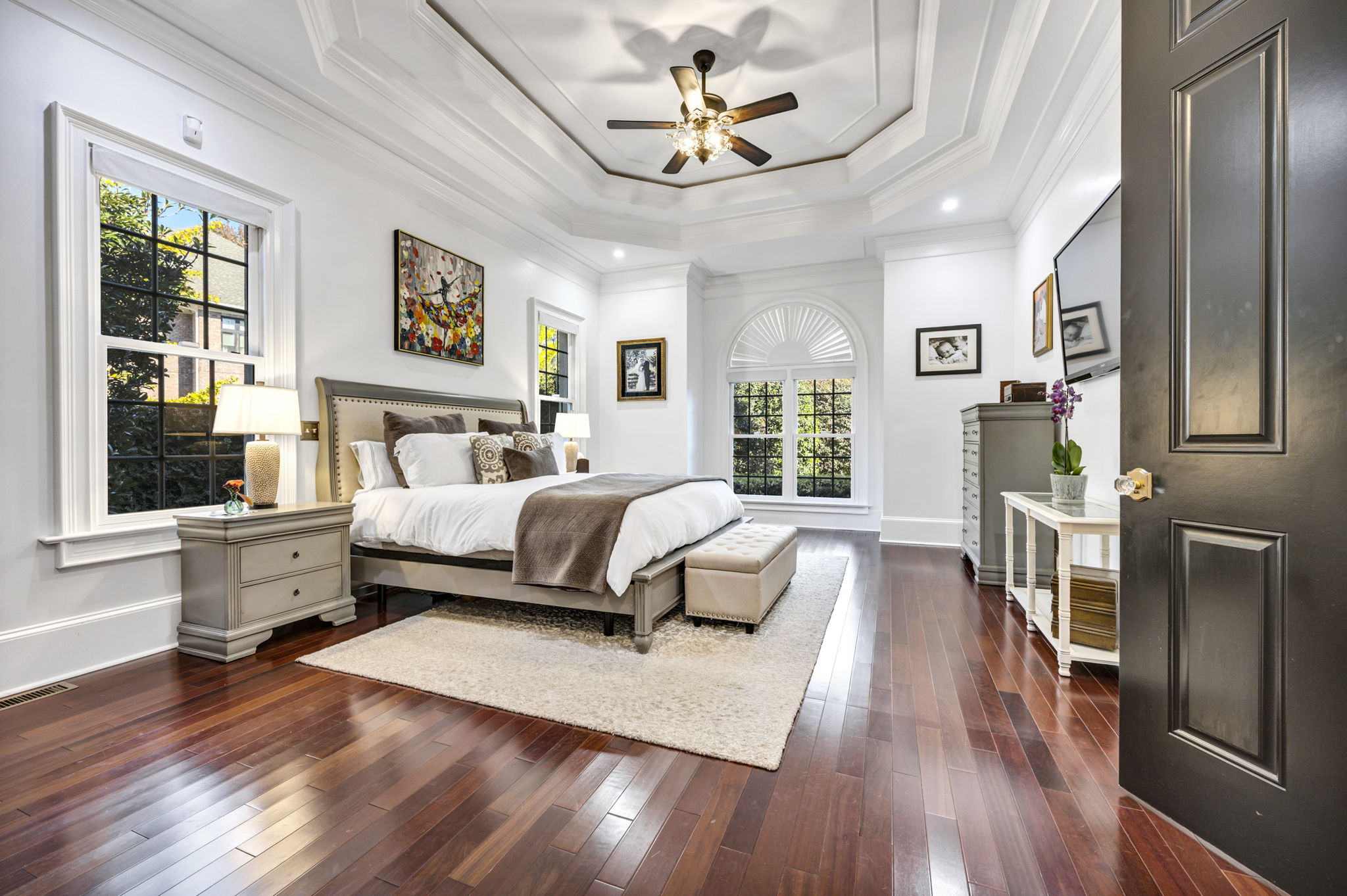 primary bedroom - hardwood flooring throughout the home