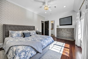 upstairs bedroom 3 w ensuite hall bath and built-in desk area, 2 closets