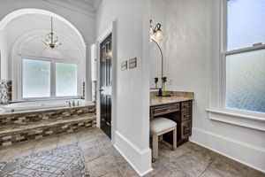 primary bath 3rd vanity; privacy glass for natural light; whirlpool tub