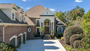 fantastic curb appeal with freshly painted garages and exterior doors and railings