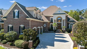 Builder's custom home 6351sf, 3-car garage, 6BR, 5.5BA+pool bath, pool, and a myriad of custom touches throughout!
