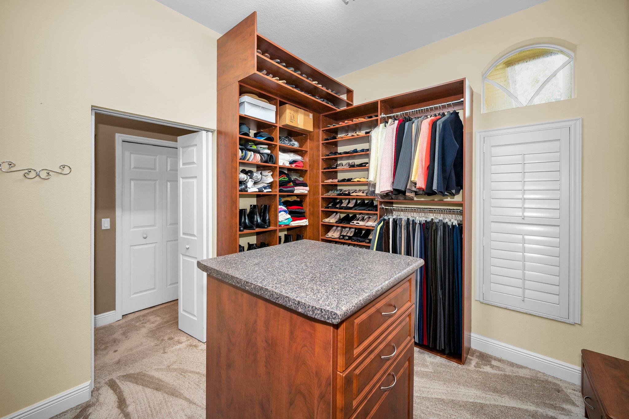 Primary Bedroom Walk-in Closet1b