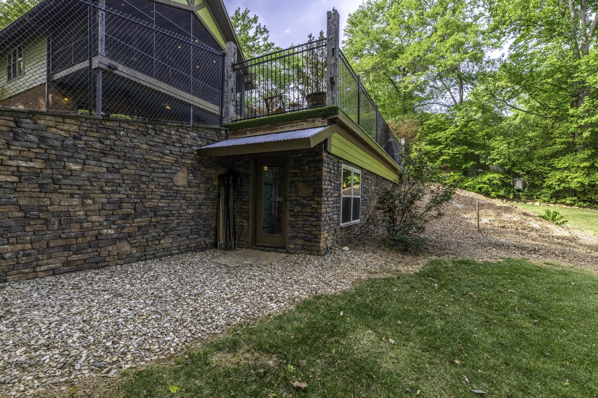 The BUNKER! Beautiful feat of engineering in Frank Lloyd Wright style.  Separate keyed entry!
