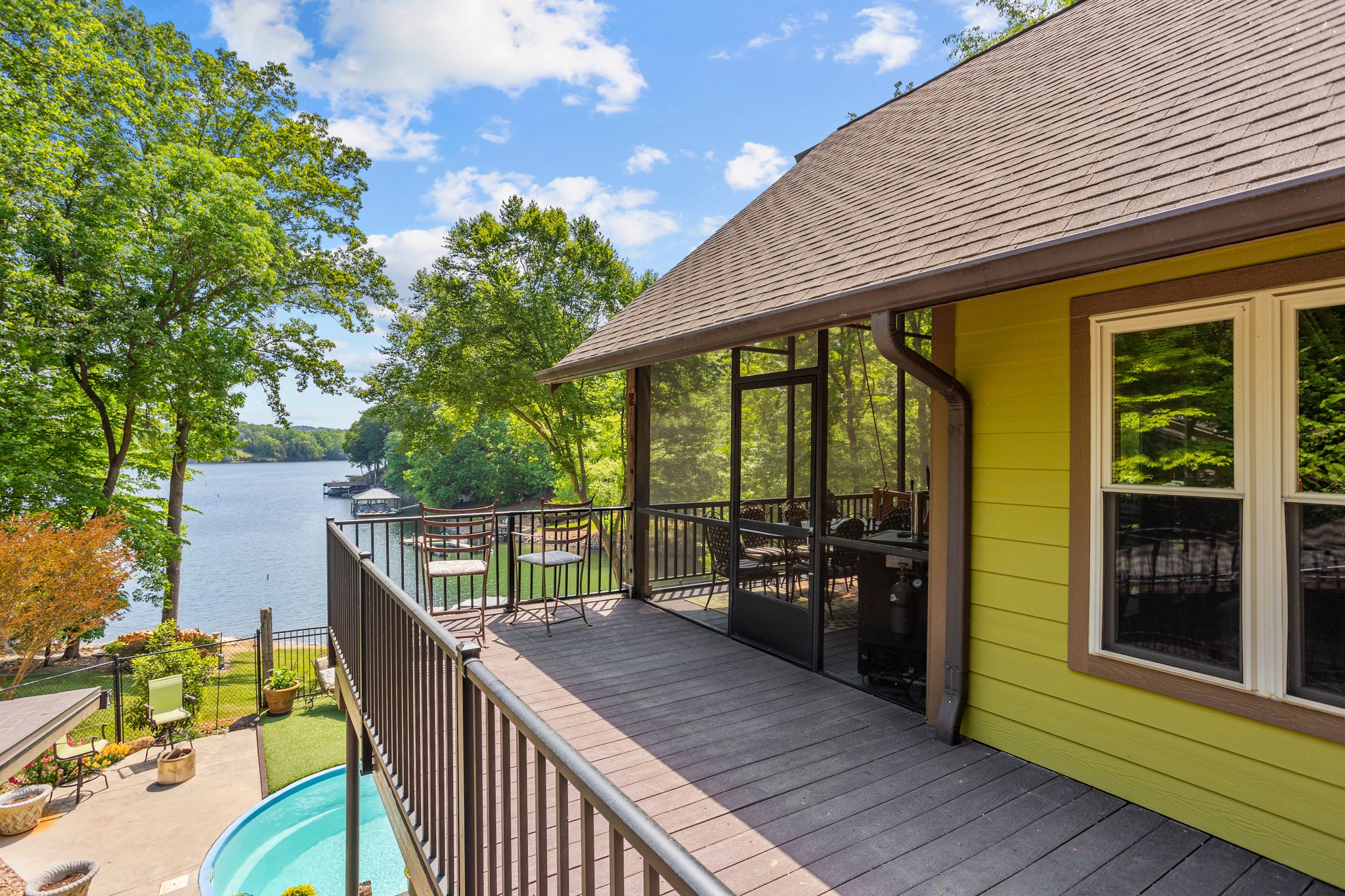 Trex decking leads to circular staircase.