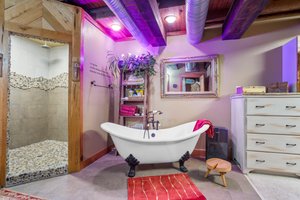 Clawfoot tub and shower with 3 heads!