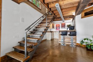 Wet Bar with refrigerator, sink and ice maker.