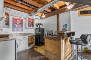 For intimate conversation -- this bar also has a stand up desk (negotiable with offer)