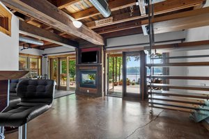 Polished concrete floors and flex space with two way fireplace!