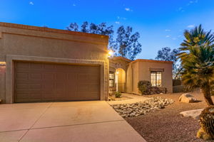 Concrete driveway and oversized one-car garage