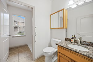 Bathroom on Main with door to Laundry Room