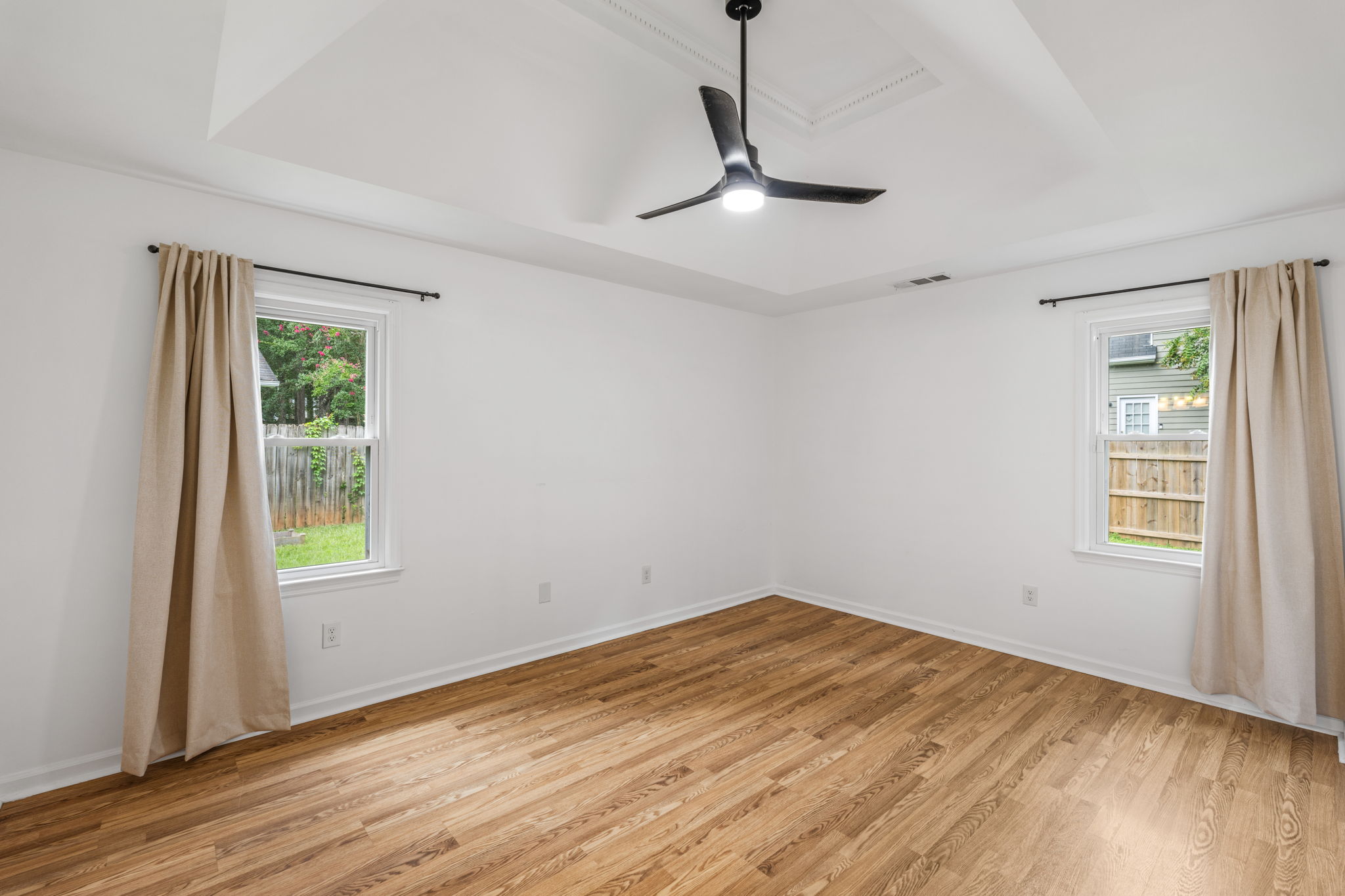 Primary Bedroom w/ Tray Ceiling