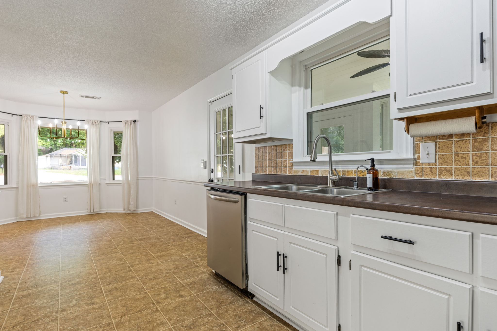 Kitchen leads into Dining Area