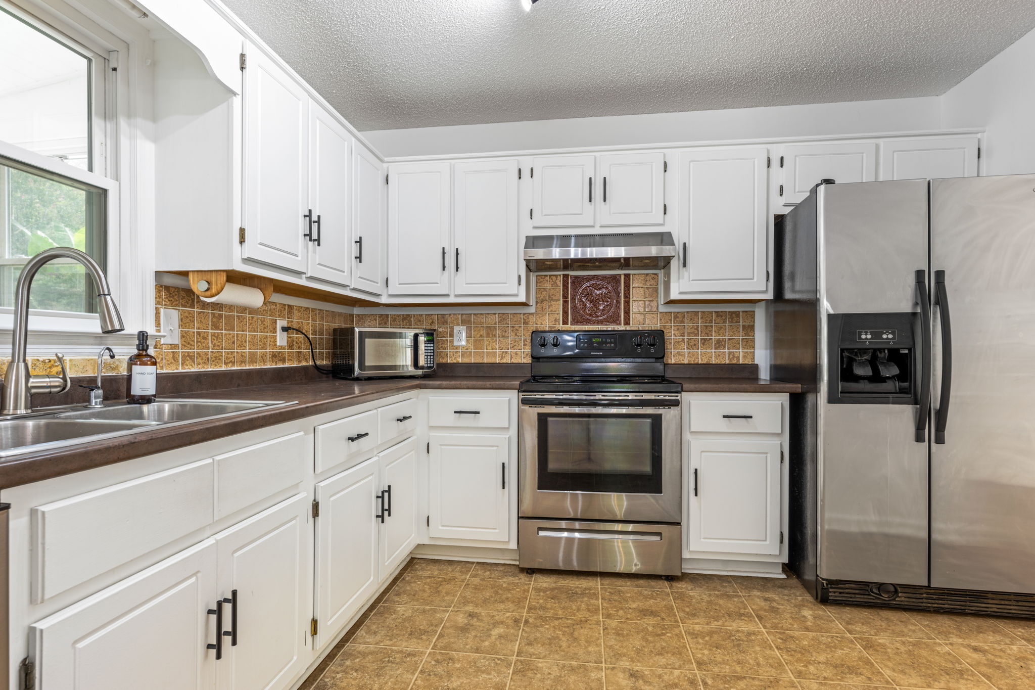 Kitchen w/ Stainless Steel Appliances