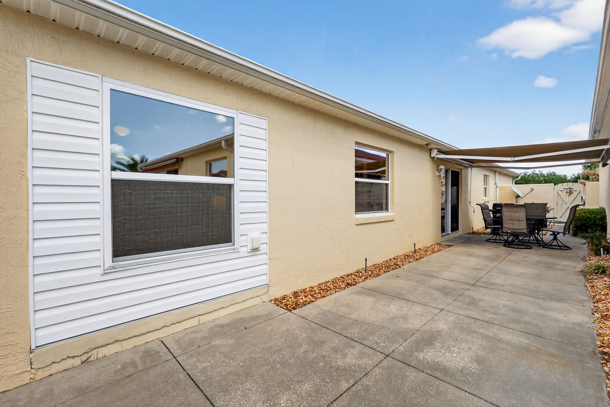 Side Patio with Remote-Controlled Awning