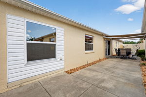 Side Patio with Remote-Controlled Awning