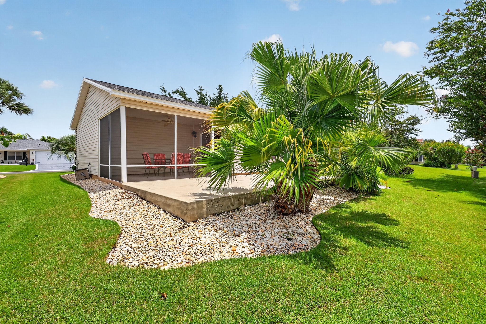 Rear and Side Elevation with Patio and Privacy Landscaping