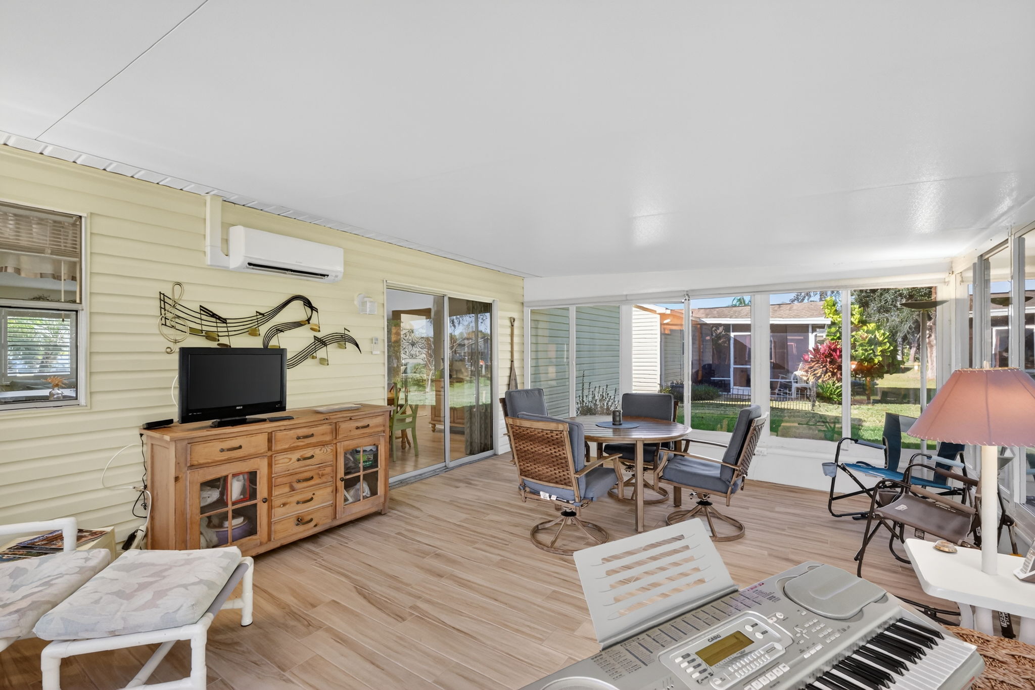 Expansive Enclosed Lanai with Mini-Split Overlooking Private Rear Yard
