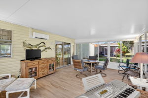 Expansive Enclosed Lanai with Mini-Split Overlooking Private Rear Yard
