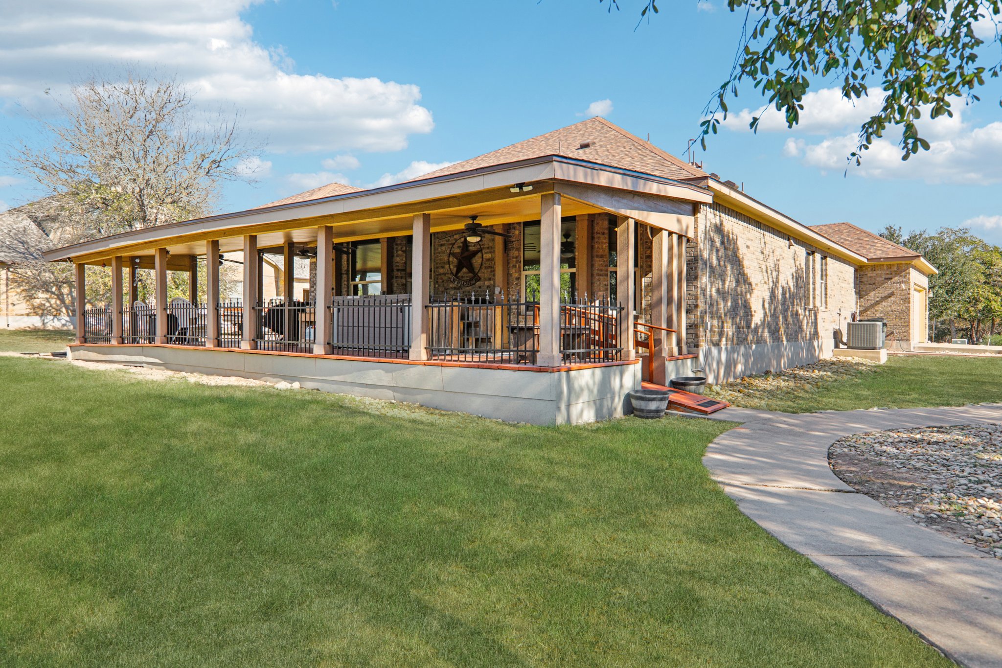 Spacious backyard and covered porch for entertainment.