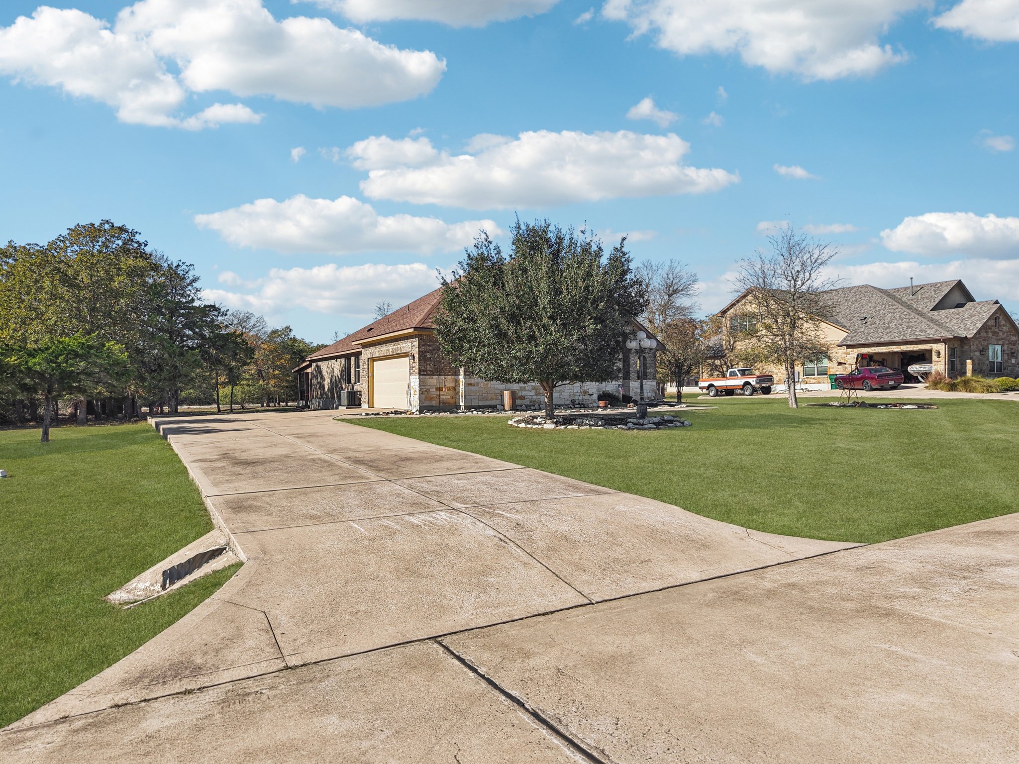 Large driveway with side entry garage