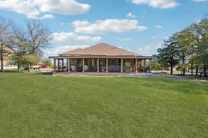 .678 Acres with large covered back porch