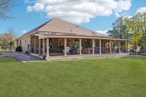 .678 Acres with large covered back porch