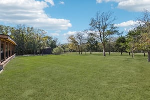 .678 Acres with large covered back porch