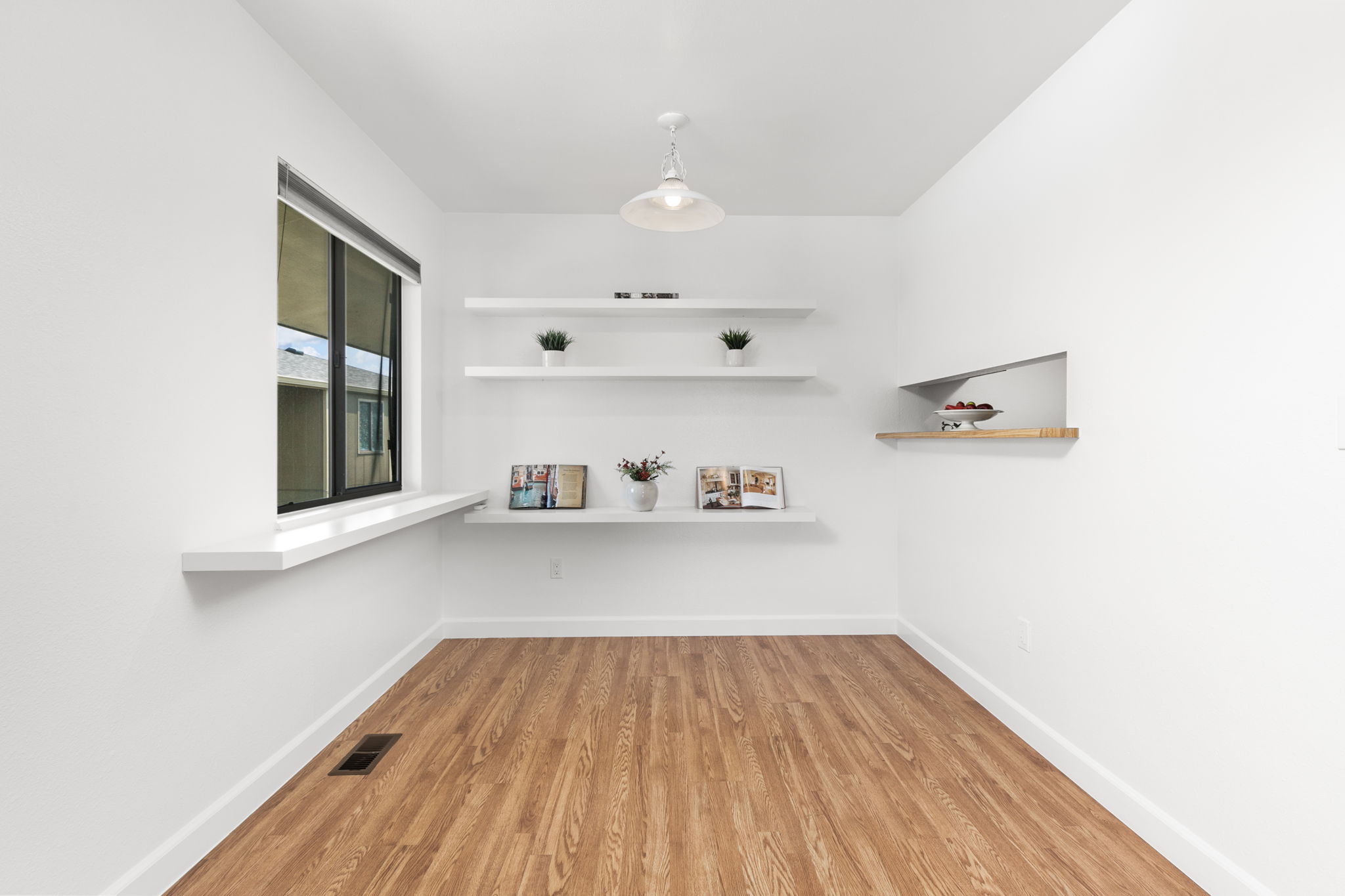 Dining Area. Built-in shelves, perfect for a library or creative decor